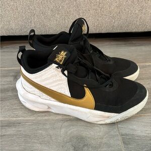 Nike basketball shoes, size 7. Used for one season.